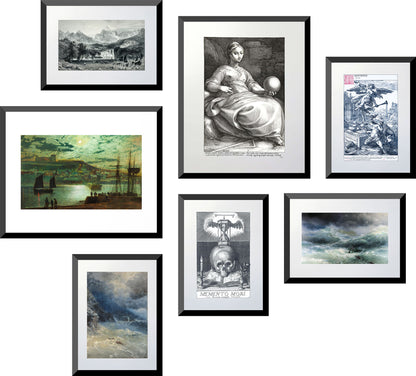 Collection of framed artworks on a white wall